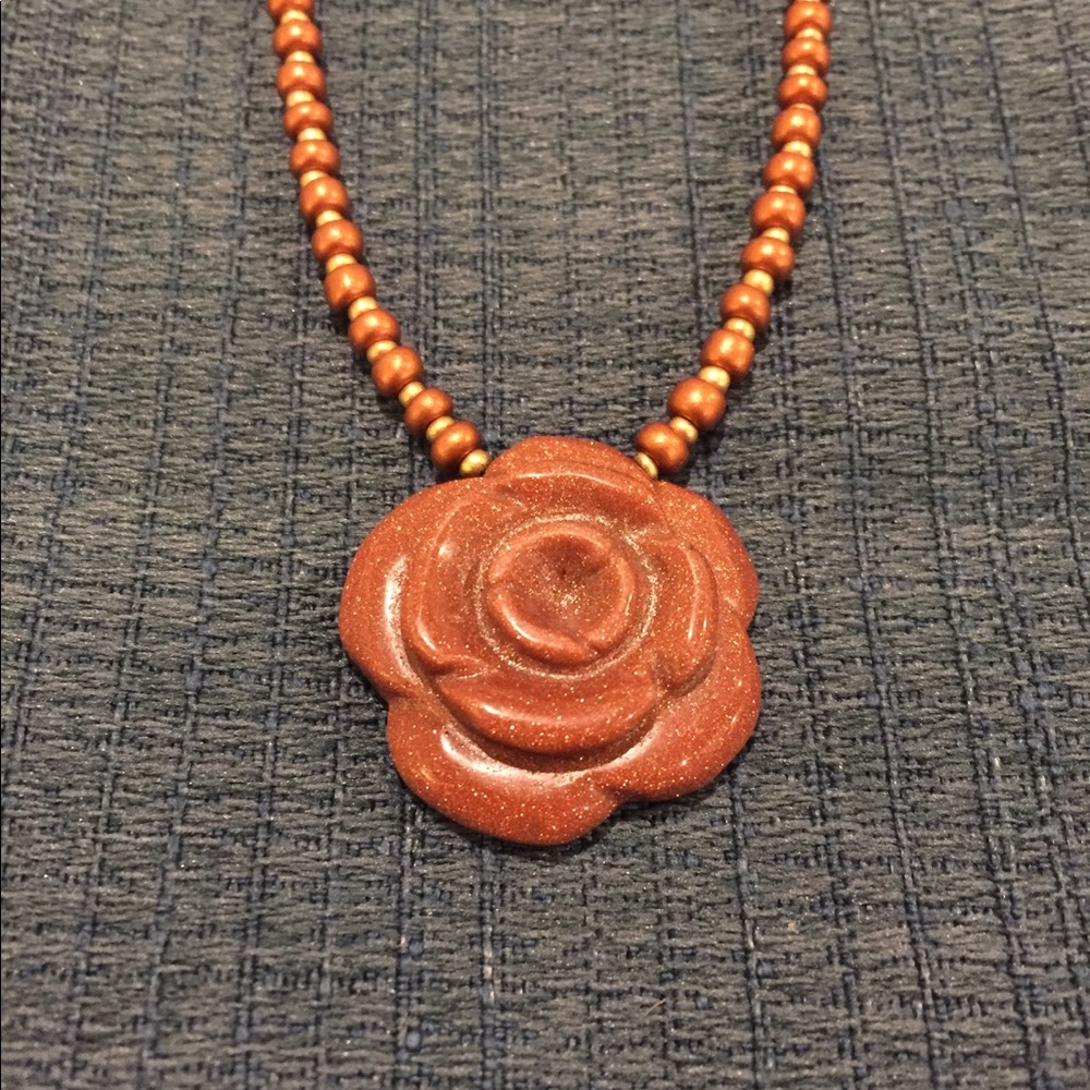 Glass flower pendent with beaded necklace